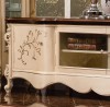 Augustine TV Cabinet shown in Egyption Pearl finish